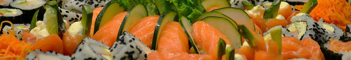 Eating Japanese Sushi at Akura Sushi restaurant in New York, NY.